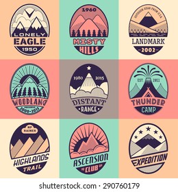 Set of alpinist and mountain climbing outdoor activity vector labels on color background.Logotype templates,badges,emblems,signs graphic collection.National parks,nature preserves exploration symbols