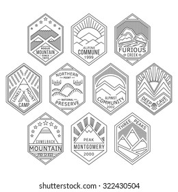 Set of alpinist and mountain climbing outdoor activity vector linear labels. Logotype templates and badges with mountains, peaks, creeks, trees, sun,tent. National parks and nature exploration symbols