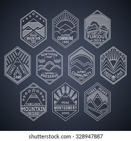 Set of alpinist and mountain climbing outdoor activity vector white linear labels.Logotype templates and badges with mountains,peaks,creeks,trees,sun,tent.National parks and nature exploration symbols