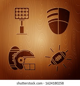 Set American Football ball, Bright stadium lights, American Football ball and helmet and Football club logo template on wooden background. Vector