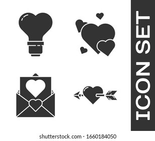 Set Amour with heart and arrow, Heart shape in a light bulb, Envelope with Valentine heart and Heart icon. Vector