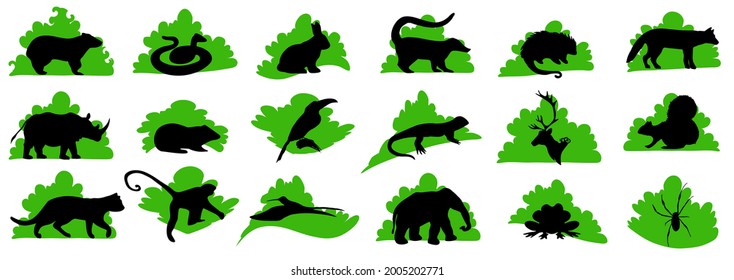 Set of animal crossing icons. Black silhouette of wild animals on green bush illustration. Vector Cartoon style.