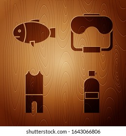 Set Aqualung, Fish, Wetsuit for scuba diving and Diving mask on wooden background. Vector