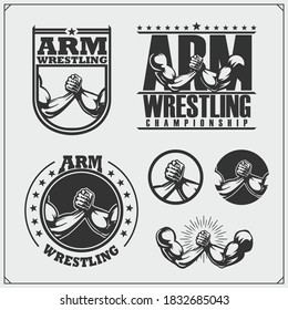 Set of arm wrestling club emblems, labels, badges and design elements. Print design for t-shirts.