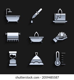 Set Aroma candle, Sauna hat, thermometer, Lotus flower, Old hourglass, Towel on hanger,  and Bathtub icon. Vector