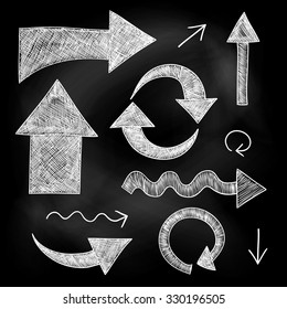Set of arrows. Vector illustration. White chalk on a blackboard