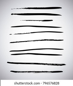 set of artistic black paint hand made creative ink brush strokes isolated on white background