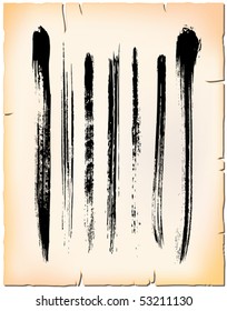 Set of artistic brush strokes on old paper sheet