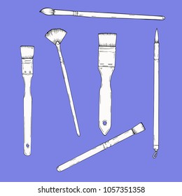 Set of artistic brushes isolated on blue background. Hand drawn vector illustration.