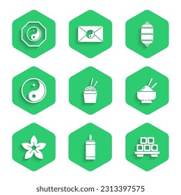 Set Asian noodles in paper box and chopsticks, Firework, Sushi on cutting board, Rice bowl with, Lotus flower, Yin Yang, Chinese lantern and  icon. Vector
