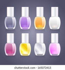Set of assorted nail polish bottles with glitter ones.