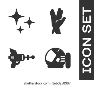 Set Astronaut helmet, Falling star, Ray gun and Vulcan salute icon. Vector
