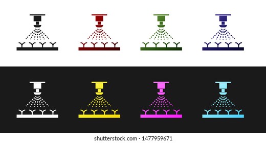 Set Automatic irrigation sprinklers icon isolated on black and white background. Watering equipment. Garden element. Spray gun icon.  Vector Illustration