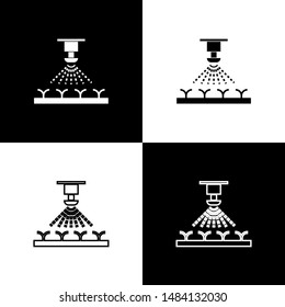 Set Automatic irrigation sprinklers icon isolated on black and white background. Watering equipment. Garden element. Spray gun icon.  Vector Illustration