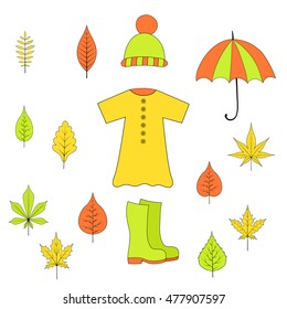 set of autumn items from leaves, rubber boots, raincoat, hat and umbrella.