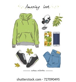 A set of autumn outfit with accessories: hoodies, parka, stylish jeans, knitted scarf, sneakers, phone case with autumn print, headphones, phone, falling leaves. Hand drawn vector illustration.