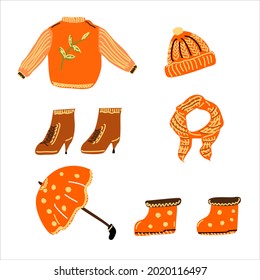 A set of autumn warm clothes and shoes.