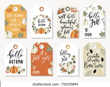 Set of autumnal tags for thanksgiving or seasonal design with pumpkins, lettering and autumn leaves.