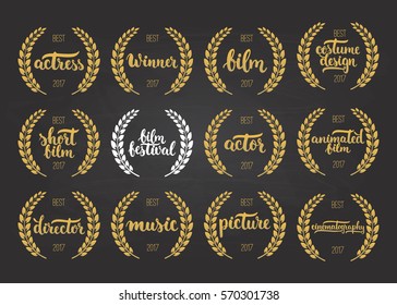 Set of awards for best film, actor, picture, animated, costume design, cinematography, actress, director, music and winner for movie festival with wreath and 2017 text isolated on the black chalkboard