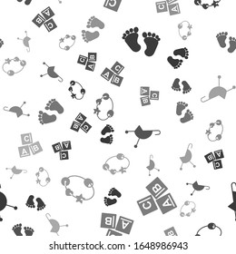 Set Baby footprints, ABC blocks, Baby stroller and Rattle baby toy on seamless pattern. Vector