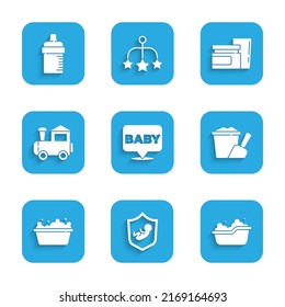 Set Baby, on shield, bathtub, Sand in bucket with shovel, Toy train, food and bottle icon. Vector