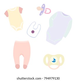Set of baby's clothes and nipples