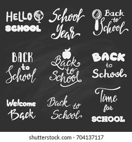 Set of Back to School lettering designs on  black chalkboard.