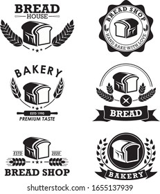 Juego de panadería y logo del pan. Vector Premium