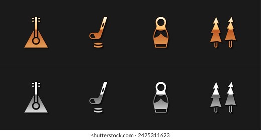 Set Balalaika, Ice hockey stick and puck, Russian doll matryoshka and Christmas tree icon. Vector