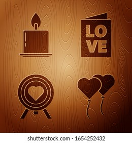 Set Balloons in form of heart, Burning candle, Heart in the center of darts target aim and Valentines day party flyer on wooden background. Vector