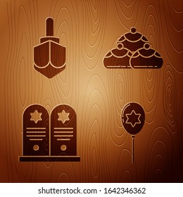 Set Balloons with ribbon with star of david, Hanukkah dreidel, Tombstone with star of david and Jewish sweet bakery on wooden background. Vector