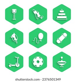 Set Balloons, Soccer football ball, Whirligig toy, Skateboard, Roller scooter, Toy horse, Pyramid and Shovel icon. Vector