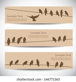 Set of banners with birds on wires