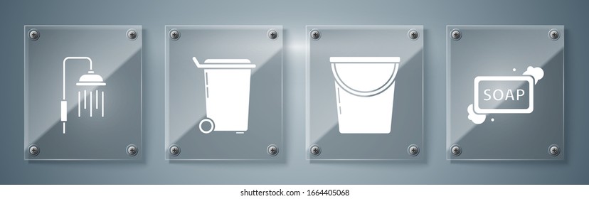 Set Bar of soap with foam , Bucket , Trash can  and Shower head with water drops flowing . Square glass panels. Vector
