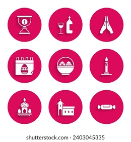 Set Basket with easter eggs, Church building, Candy, Burning candle candlestick, Easter cake, Calendar, Hands praying position and Christian chalice icon. Vector