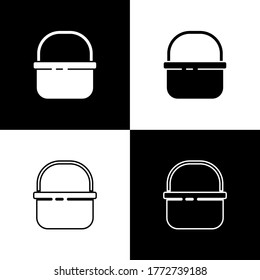 Ajuste el icono de la canasta aislado en fondo blanco y negro. Concepto de compra en línea. Signo de servicio de entrega. Símbolo del carro de la compra. Vector
