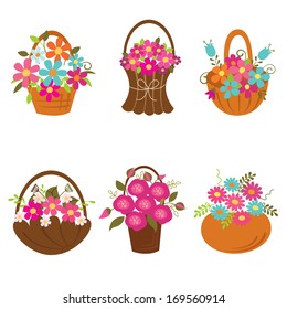 Set of baskets of flowers isolated over white