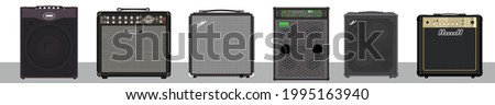 Set of bass and guitar amplifiers and speakers. Concert equipment. Material for rider of artist-musician. Rehearsal combo. Music studio theme. Guitar monitoring. Portable monaural speaker system.  Stock fotó © 