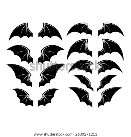 Set of bat wings. Dragon wings. Design element for emblem, sign, poster, card. Vector illustration