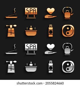 Set Bathtub, Kettle with handle, Yin Yang, Cream or lotion cosmetic tube, Perfume, Heart, Scented spa stick and Spa salon signboard icon. Vector