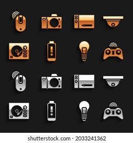 Set Battery charge level indicator, Motion sensor, Wireless gamepad, Light bulb with concept of idea, Vinyl player, Graphic tablet, computer mouse and Photo camera icon. Vector