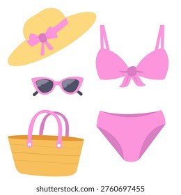 Set of beach accessories hat, swimsuit, goggles and bag. The concept of holidays and summer holidays