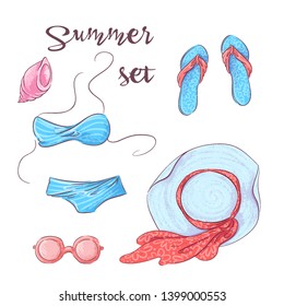 Set beach accessories on the sand. Vector illustration.