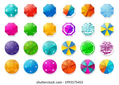 A set of beach umbrella icons with a top view. Collection Summer of parasols. Beach holiday design elements. Stock vector illustration.