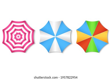 A set of beach umbrellas isolated on a white background. Top view