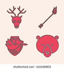 Set Bear head, Deer head with antlers, Flame arrow and Flying duck on shield icon. Vector