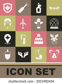 Set Bear head, Deer with antlers, Montreal Biosphere, Bottle of maple syrup, Wind turbine, Hockey helmet, Canada flag shield and Canadian totem pole icon. Vector