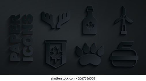 Set Bear paw footprint, Wind turbine, Pennant flag of Canada, Stone for curling, Bottle maple syrup and Deer antlers icon. Vector