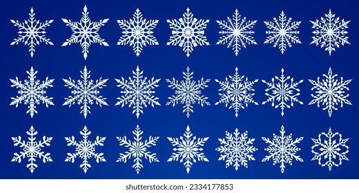 Conjunto de hermosos complejos copos de nieve navideños, blanco sobre fondo azul
