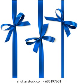 Set of beautiful decorative bows with vertical ribbon for gift decoration. Vector blue bow isolated on white